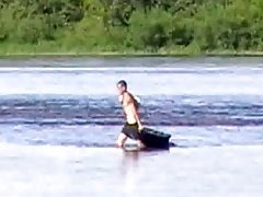 Boy on river