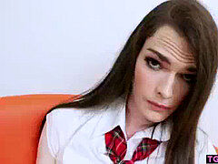 thin tranny Kira poking herself with huge dildos