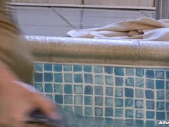 Fully dressed three lesbians in the pool