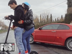 Megan Fiore jerks off Jordi ENP while riding an electric scooter down an empty road