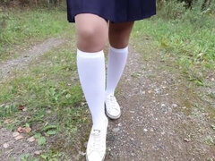 Schoolgirl in White Knee Socks Explores Nature Foot Fetish