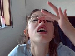 Smiley brunette teen in glasses showing off her petite body solo