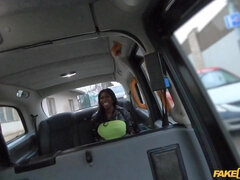 Silicone black slut with huge melons gets fucked in the taxi