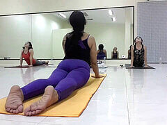 Yoga session with a hot milf instructor