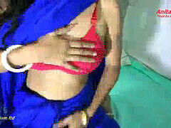 Sexy Indian bhabi in a blue saree gets her hairy pussy fucked in a steamy homemade video