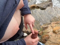 Handjob by the beach leads to a massive cum shot