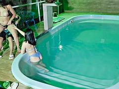 Caught in the Act! Two Brunettes Caught Masturbating in the Condos Pool
