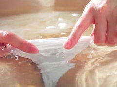 Amazing asian nymph shows her beautiful boobs