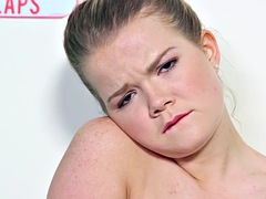 Teen Lexy Adams does a peep show with a cheerleader