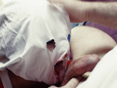 A blonde that has a mask on is getting anally pounded hard