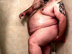 Hairy gay bear enjoys big dildo play and anal stretching