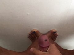 Slowmotion cumshot with piercing and painted toenails