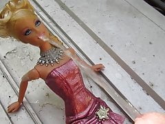 Golden Shower Barbie gets Pissed on Following Cum Shots