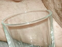 Quick handjob and a powerful eruption of sperm in a glass! CLOSE-UP
