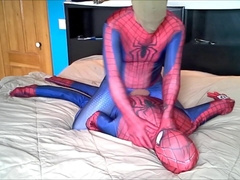 hooded spiderman fights against spiderman