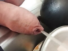 Close up peeing on dishes