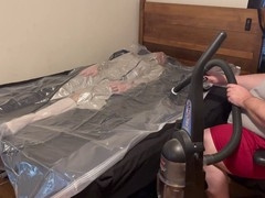 Vacpacked in latex sleepsack with jacket