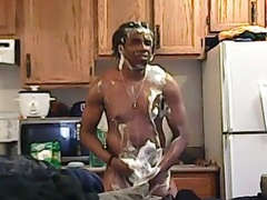 Hot and skinny black muscle man shows off his impressive cock and muscles on webcam