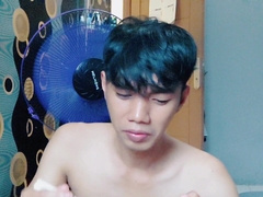 Gorgeous young dude is slurping noodles sans using t tee-shirt