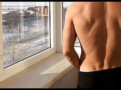Insolent Russian guy jerks off in front of neighbors
