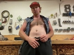 Redhead construction worker jerks off alone in workshop