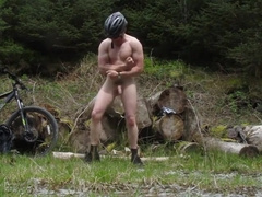Muscle Stud Gets Naked On A Bike Ride In The Woods Flexes Muscles And Cums (old Vid)