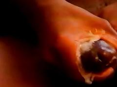 Gay black guys share a big double ended dildo