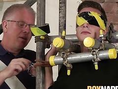 Twink tied up by an older master for BDSM play