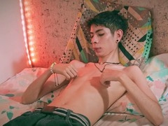 Slim young man pleasures himself alone to a dripping finale