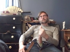 stroking off through denim