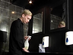 Inked blond fella deepthroats a twink in the bathroom