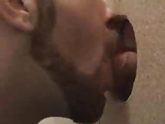 Hot sucking action at the homemade glory hole 7