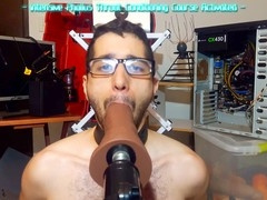 Gay boy locked in cage of Priapus gets toyed with huge dildos and throat training