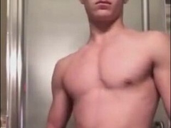 Muscular Twink Strokes His Big Cock in Bathroom Solo