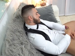 Watch how this wealthy hunk flaunts his assets in front of the camera.