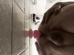 Fat guy taking dildo deep in shower