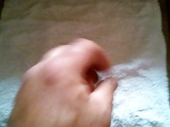 Masturbating