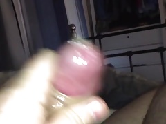 Wanking and cumming in a condom
