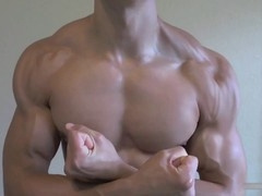 Muscular Men Showing Off Their Pecs