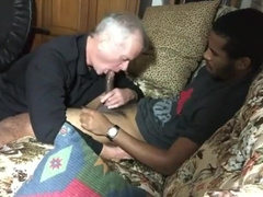 Young black dude lets a older white guy suck his BBC on cam