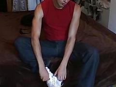 Stud removes clothes and plays with his bare feet solo