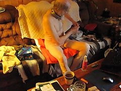 Masturbating  using oil,toys and bondage