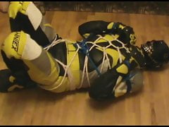 Tied bikerslave gets a spanking.