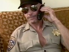 Sucking session in leather uniform