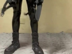 Condom fellow dressed in rubber gear