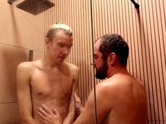 Twink gives his stepdad a blowjob while taking a bath