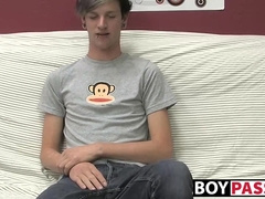 Adorable gay guy Danny jerks off his dick on couch solo