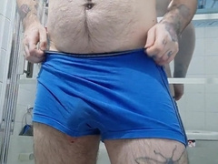inked unshaved dude blows a load before taking a bathroom