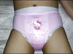 teen wearing pink diaper panties and humping pillow cum in diaper