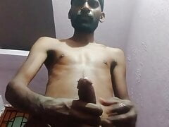 Rajesh masturbating, spitting on cock & cumming in glass 2